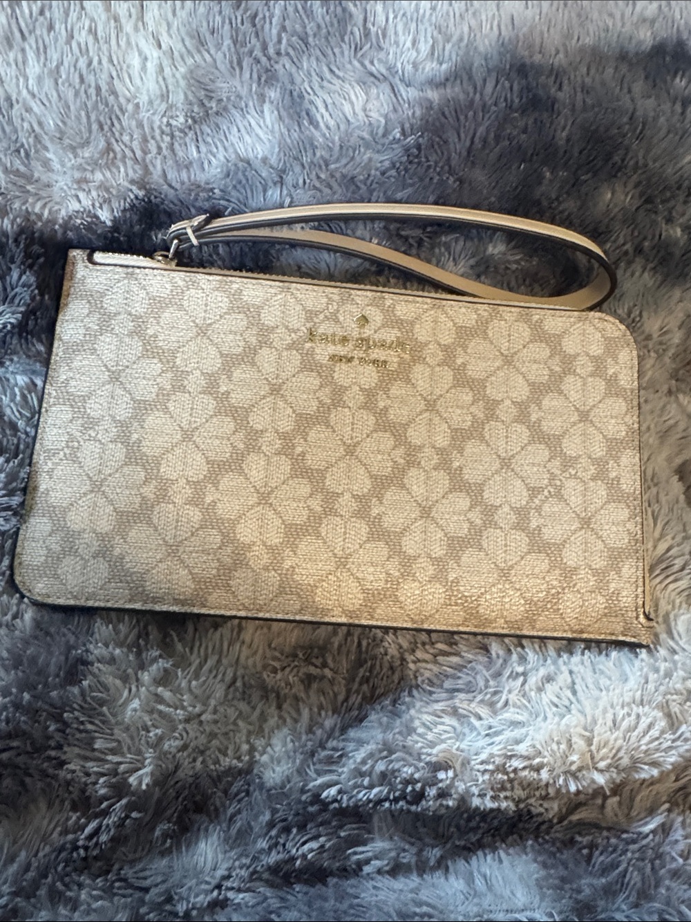This is the Kate Spade Lucy Spade Flower Medium L-Zip Wristlet - Dark Beige